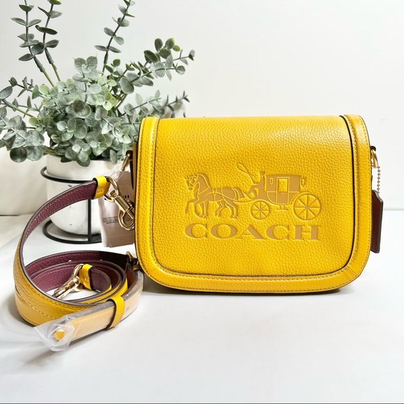 Coach Saddle Bag With Horse And Carriage Crossbody Bag
Gold/Ochre/Vintage Muave - Picture 3 of 10